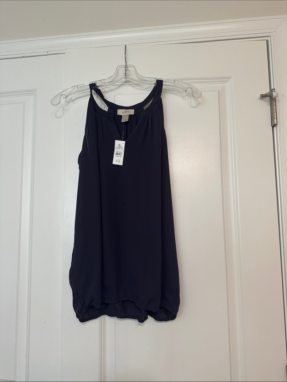 NWT size XS LOFT Navy Sleeveless Bubble Hem Blouse